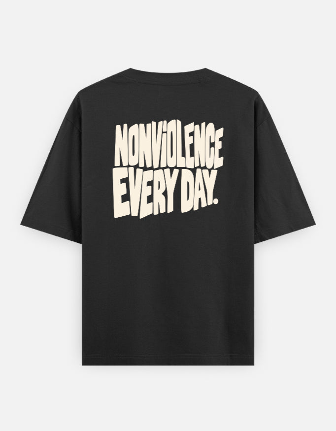 Nonviolence, every day — Qikink UC22 Black T-shirt, back print