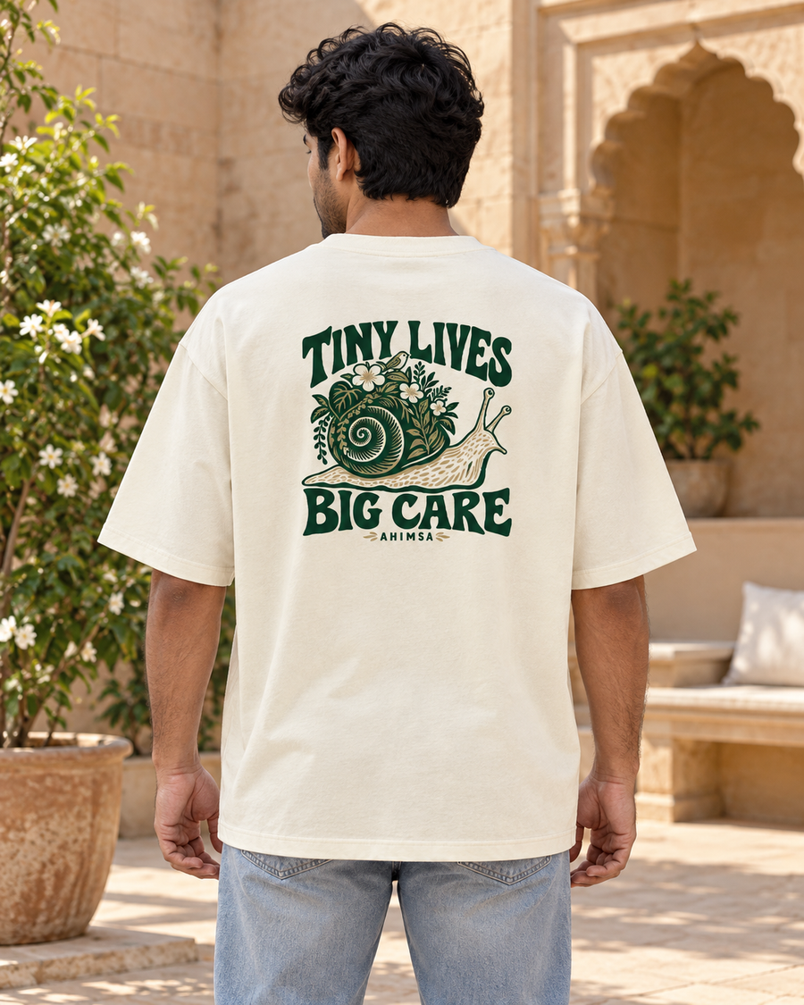 Tiny lives. Big care. — back view · Off White oversized T-shirt · Styling illustration.