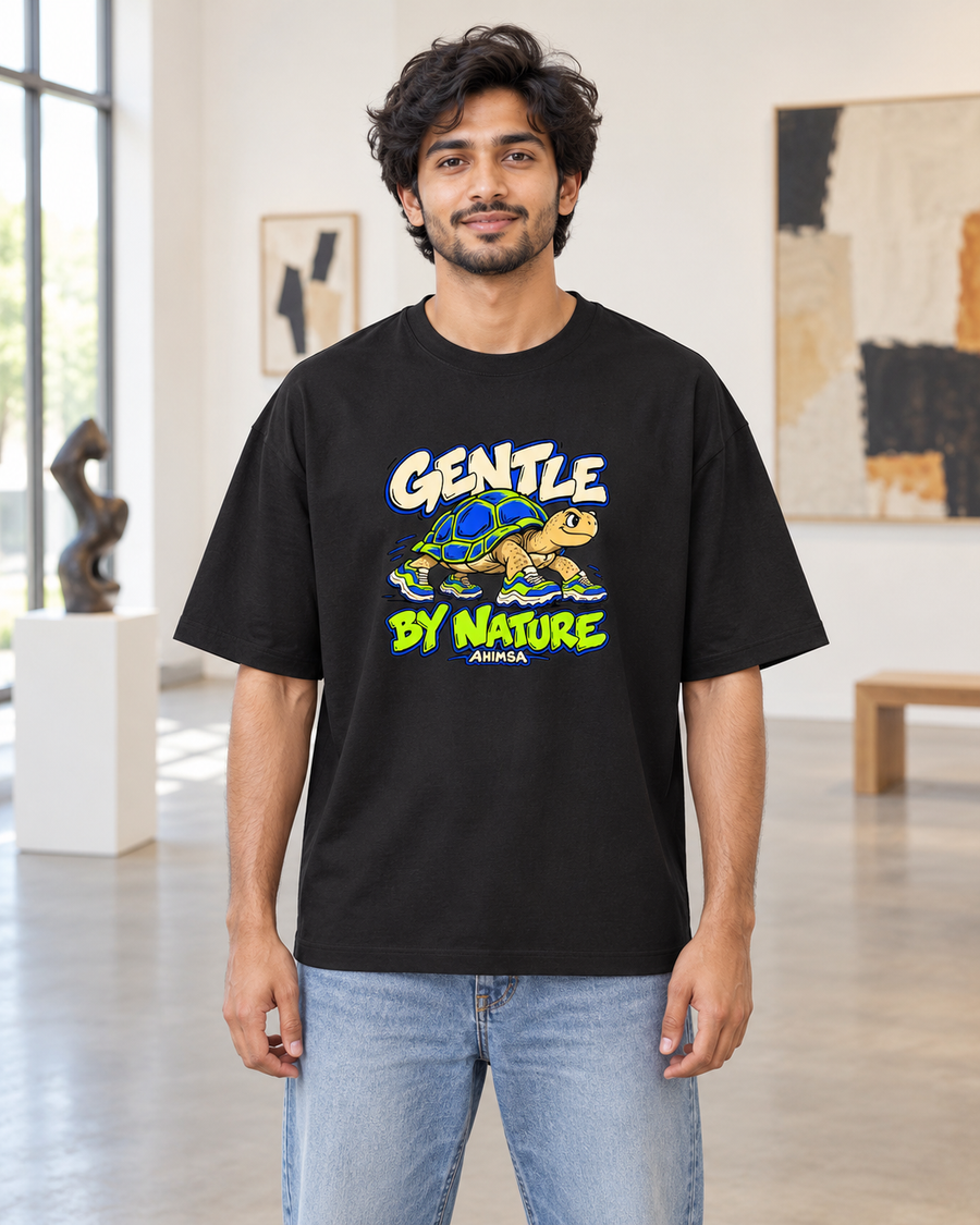 Gentle by nature — front view · Black oversized T-shirt · Styling illustration.